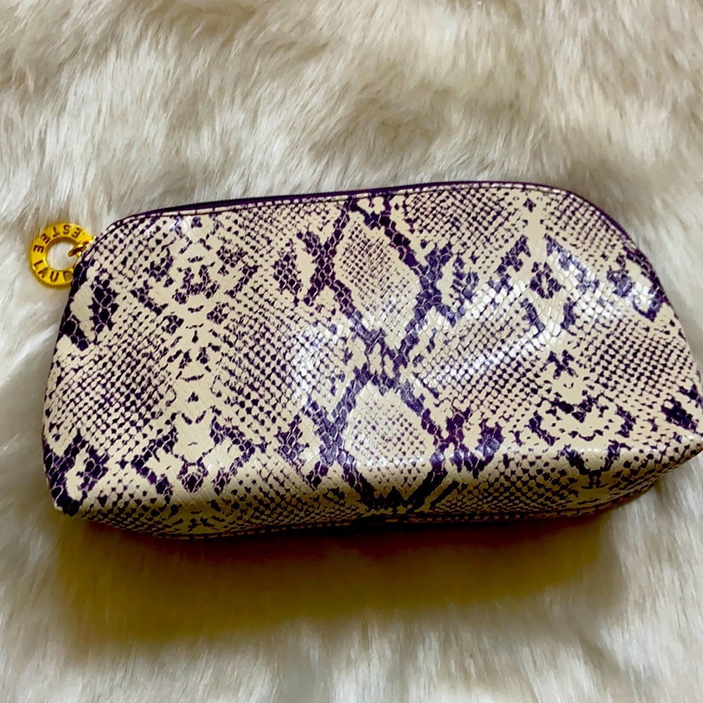 Estée Lauder snake print makeup purse